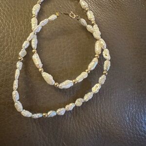 14k clasp and 10k clasp plus spacer beads on Lustrous pearl braceletss